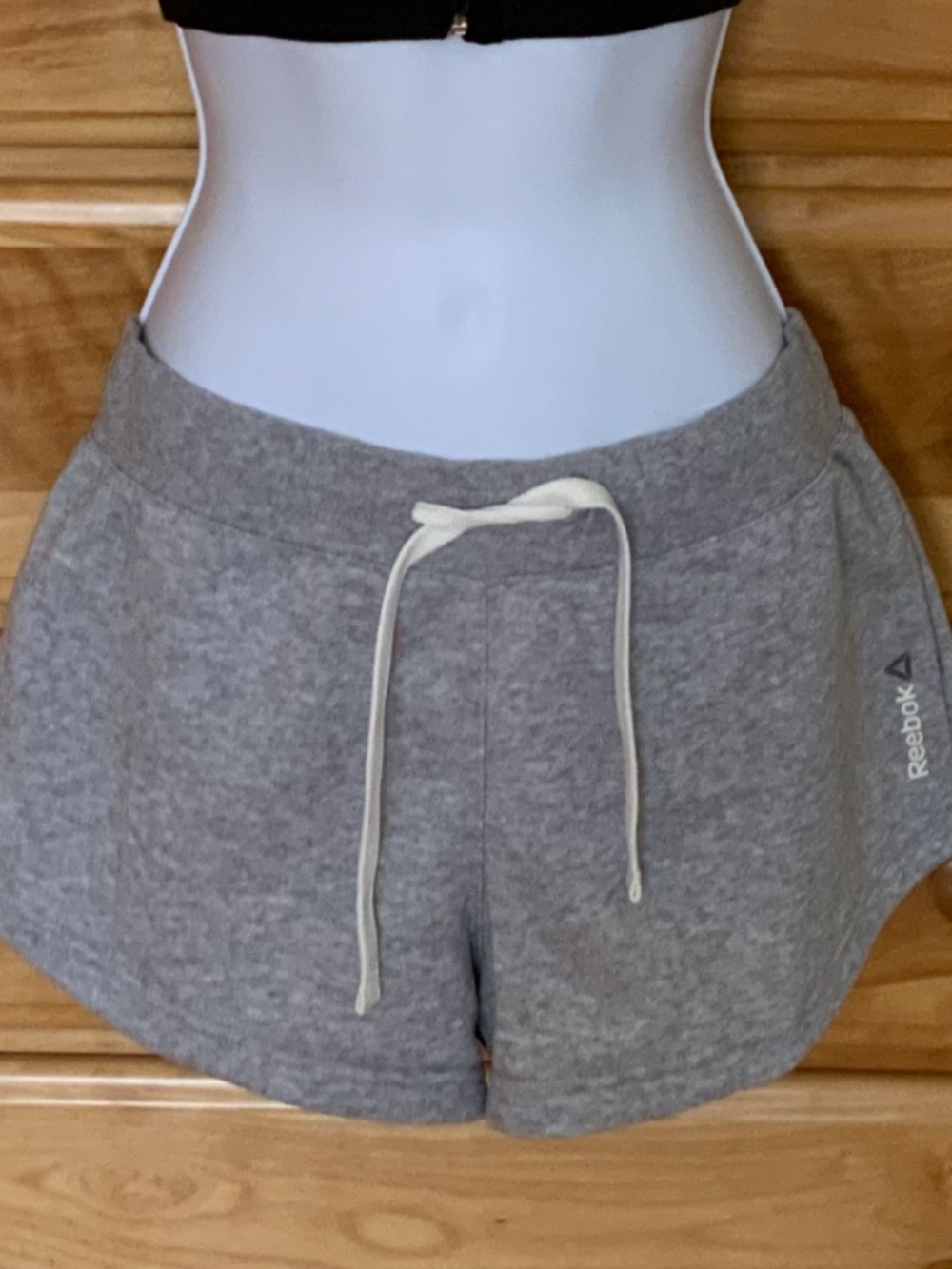 Reebok women’s shorts, medium size, colour light grey